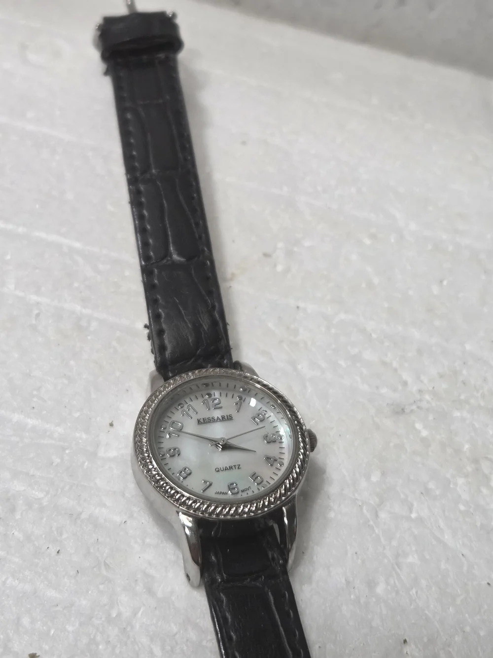Kessaris Women's Silver Case Watch with Black Leather Strap